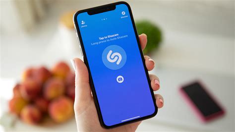 You can switch to other apps while Shazam tries to identify a song. When Shazam identifies the song, you get a notification. The Shazam app on iPhone or iPad can identify songs playing on your device even when you're using headphones. Once Shazam has identified a song on iPhone, iPad, or Apple Vision Pro, tap the play button to preview.